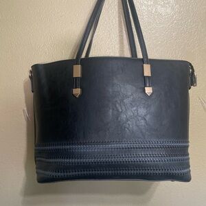 Elegant Black Tote Bag little damage to the handles good condition